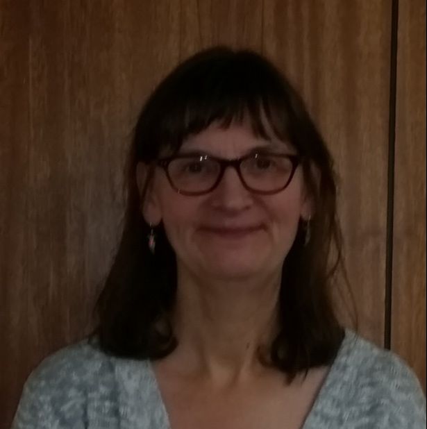 Diverse woman supporting community services at Catholic Community Services.